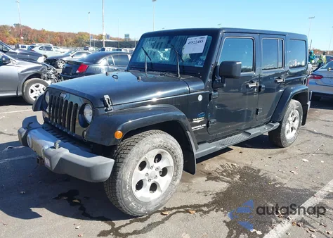 2015 Jeep Wrangler Unlimited Sahara из США, поврежденный, VIN 1C4HJWEG0FL695130